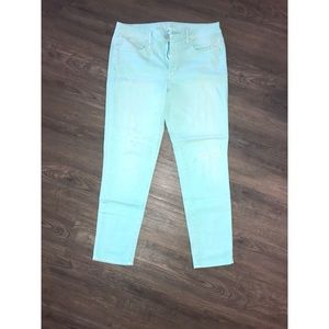 Mid-Rise Jeggings. Mint green in color